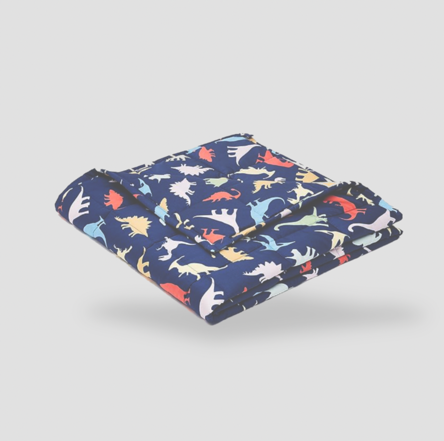 Folded navy dinosaur print kids weighted blanket on white background, product view