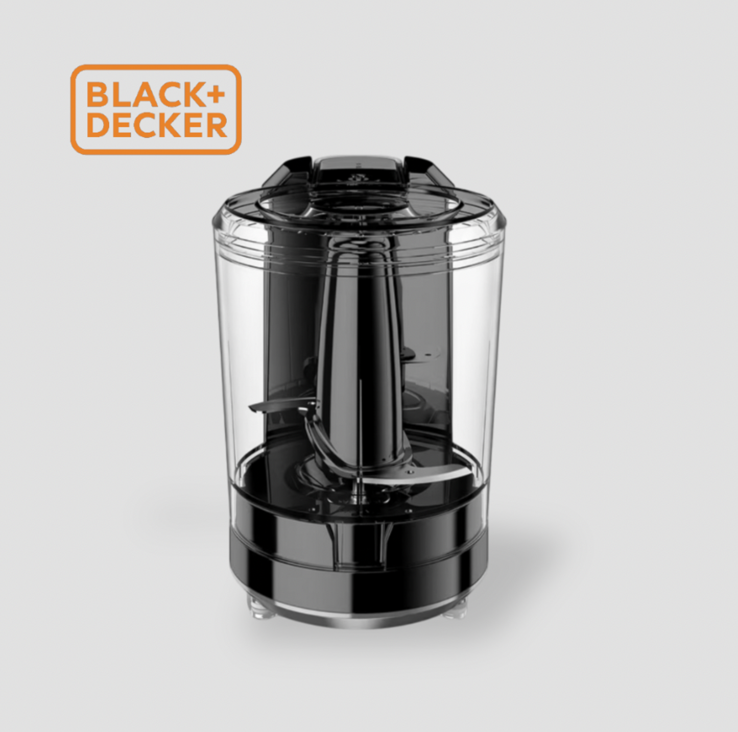 Bol hachoir transparent détaché du mini robot culinaire BLACK+DECKER avec lame en acier inoxydable visible à l'intérieur et couvercle noir sur le dessus