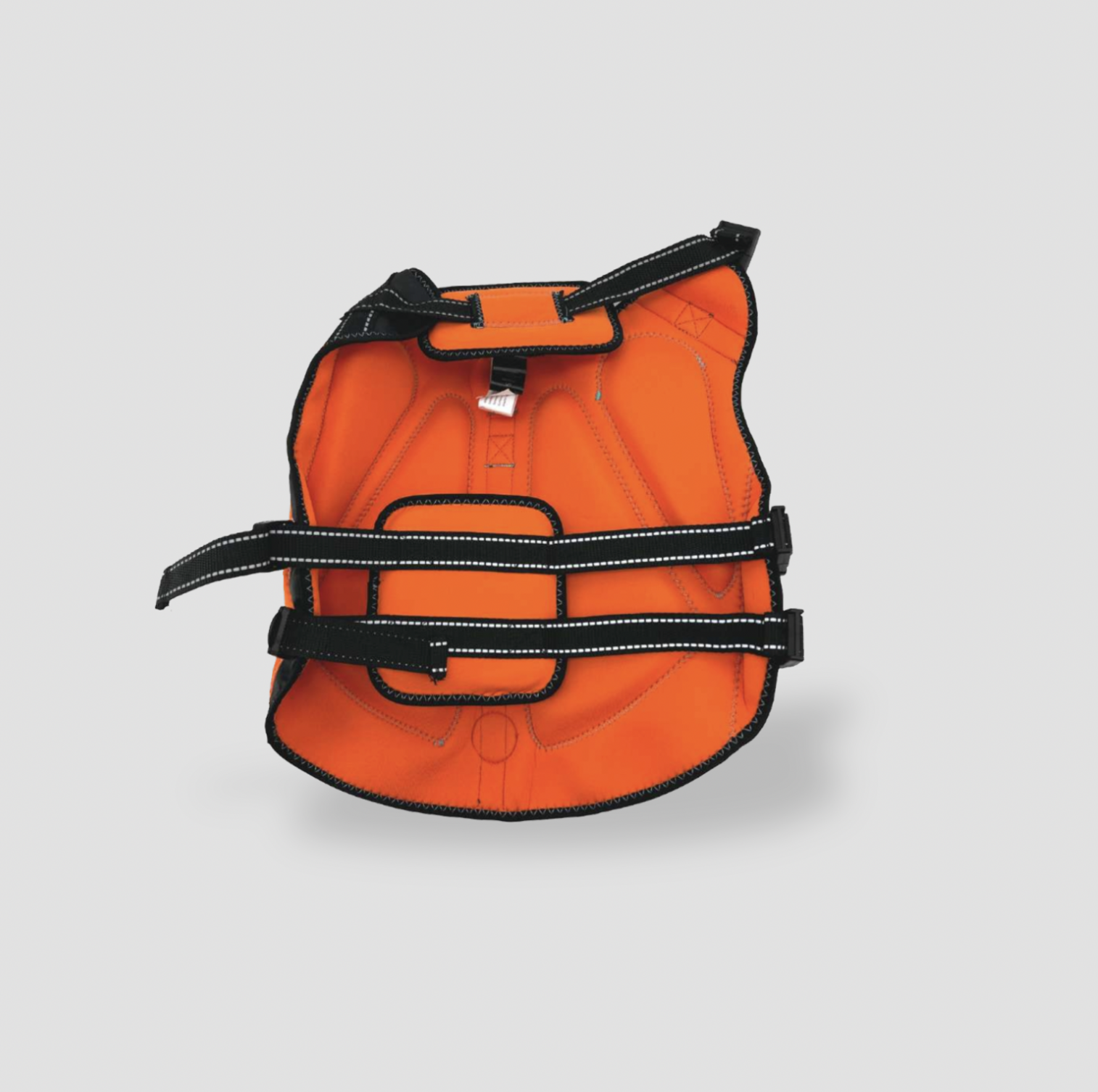 Vue de dessus du gilet de sauvetage pour chien orange montrant la poignée sur le dessus et deux sangles d'ajustement réfléchissantes