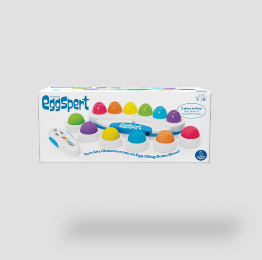 Boîte d'emballage commerciale du jeu de buzzer pour salle de classe Educational Insights Wireless Eggspert montrant la base avec boutons œufs arc-en-ciel et la télécommande sans fil, dès 6 ans
