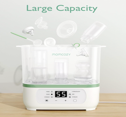 Stérilisateur Momcozy chargé de biberons, tétines et accessoires flottants, mention Large Capacity au-dessus de l'appareil blanc et vert