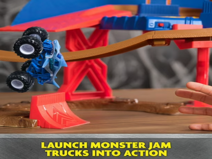 Blue monster truck mid-jump off red ramp on Monster Jam Speedway track with Launch monster jam trucks into action callout