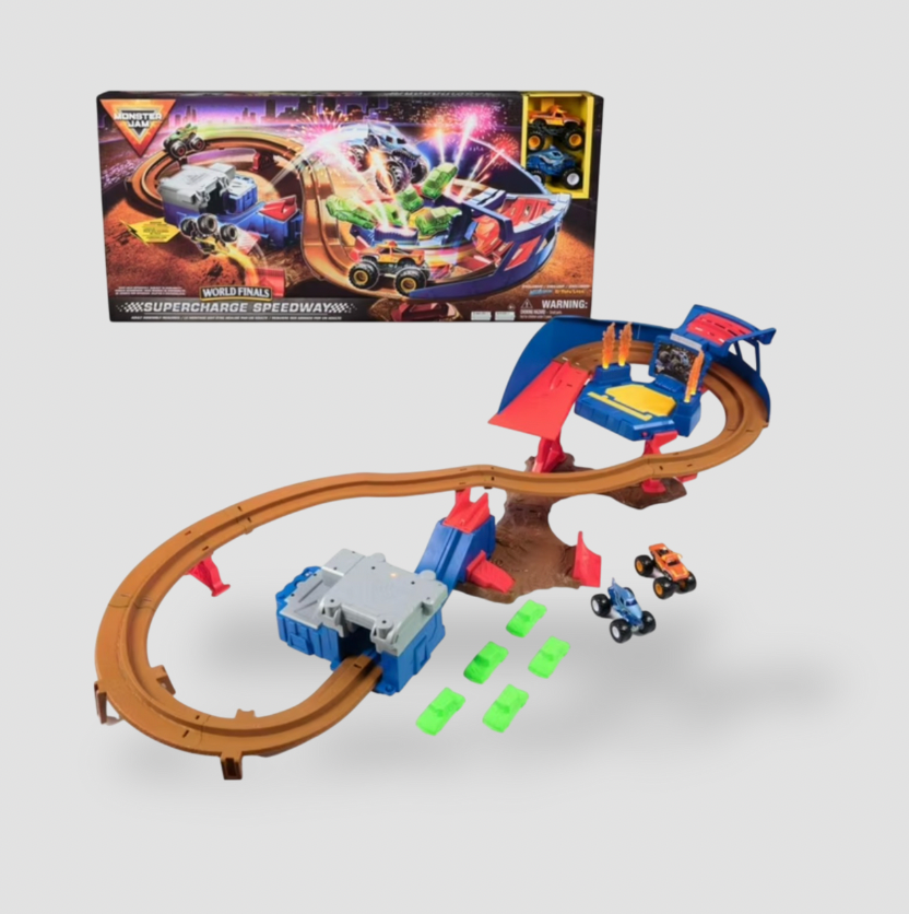 Assembled Monster Jam Supercharge Speedway track playset with loop, ramps and two monster trucks in front of box