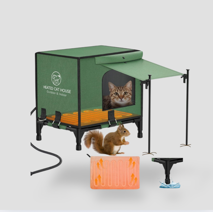 Maison chauffée pour chat Pawaboo verte avec auvent, cadre noir surélevé et chat tigré à l'intérieur, avec écureuil, tapis chauffant et cordon d'alimentation accessoires