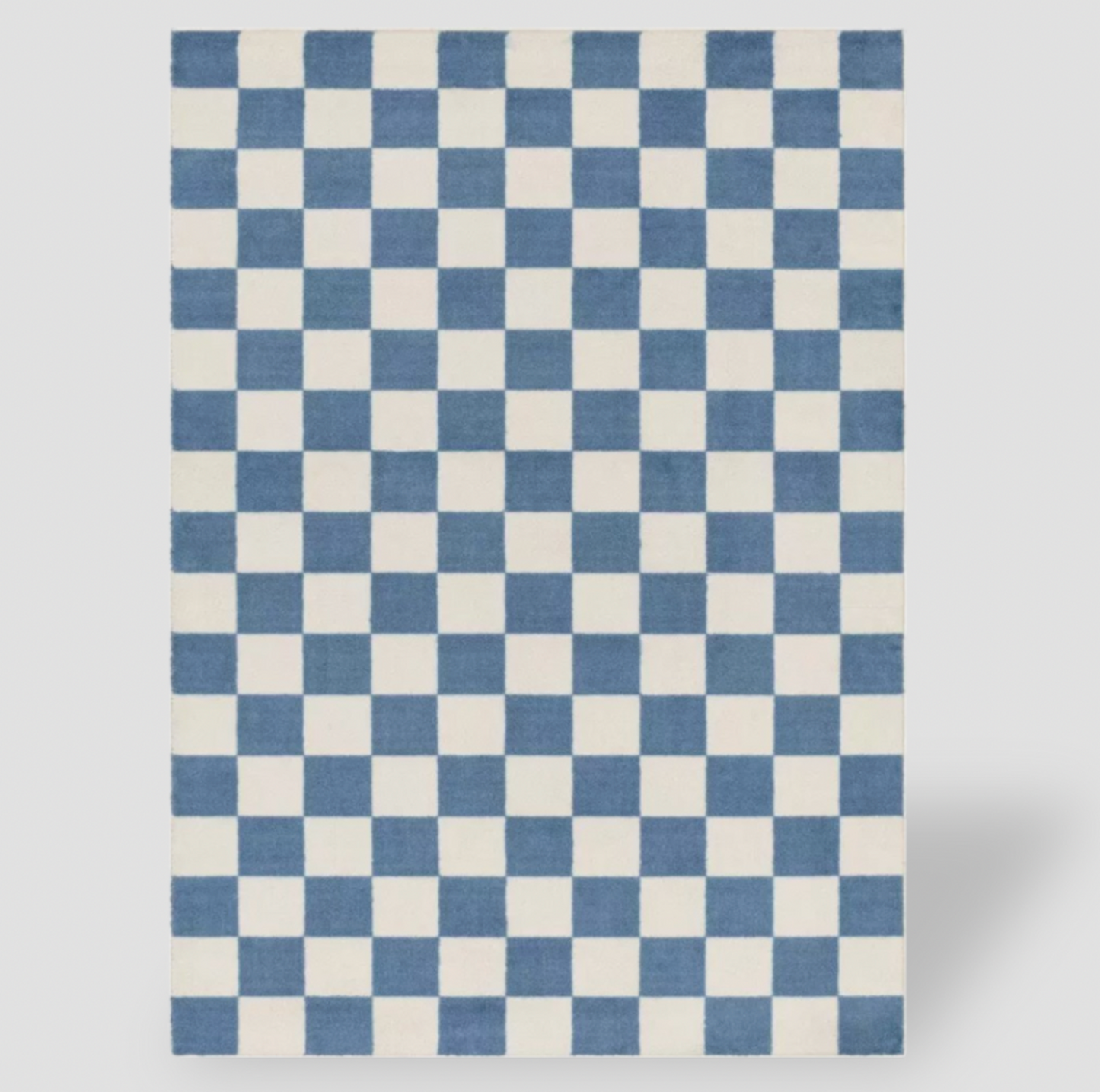 Tapis pour enfants à damier bleu et crème, vue rectangulaire en plongée