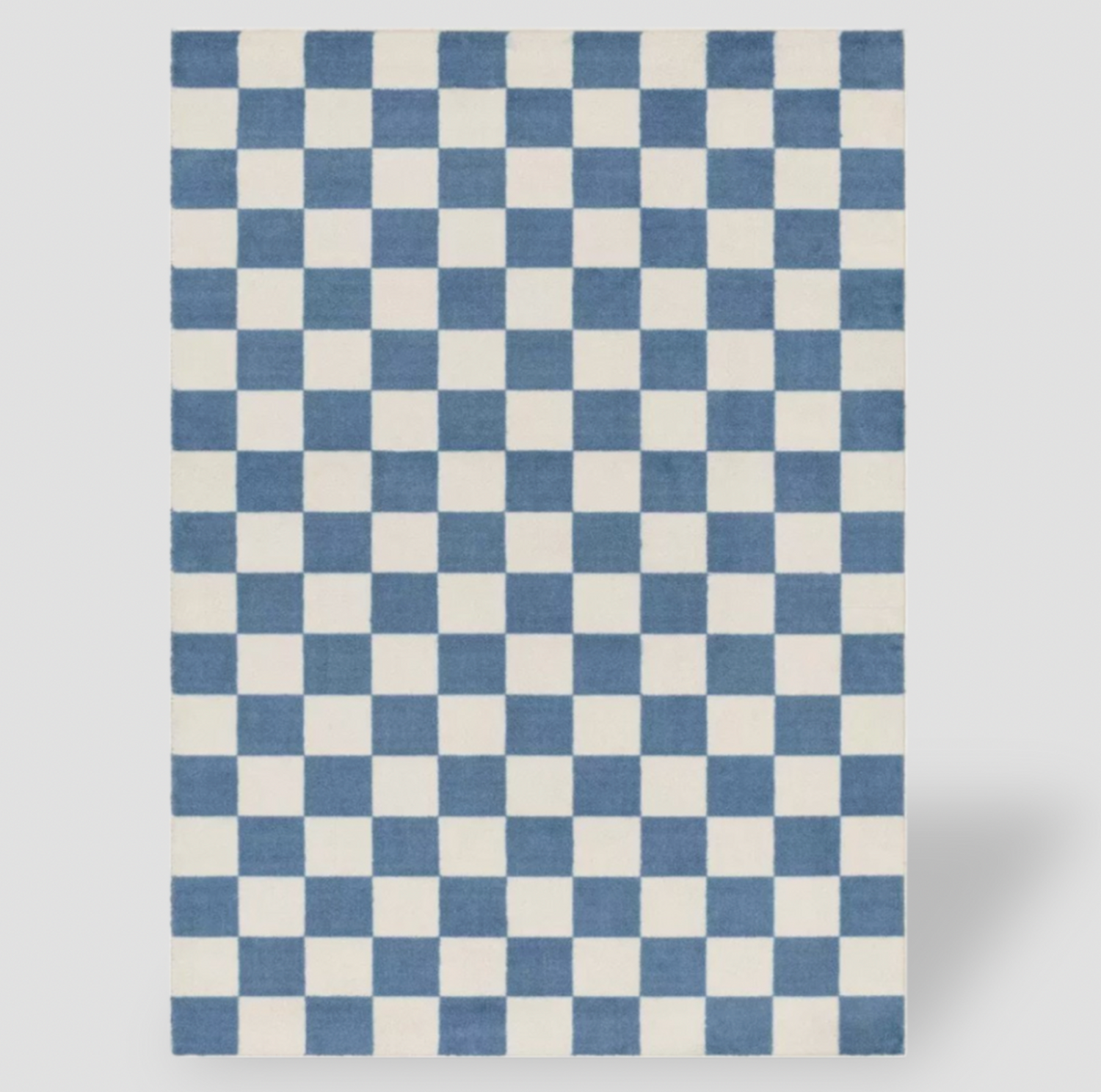 Tapis pour enfants à damier bleu et crème, vue rectangulaire en plongée