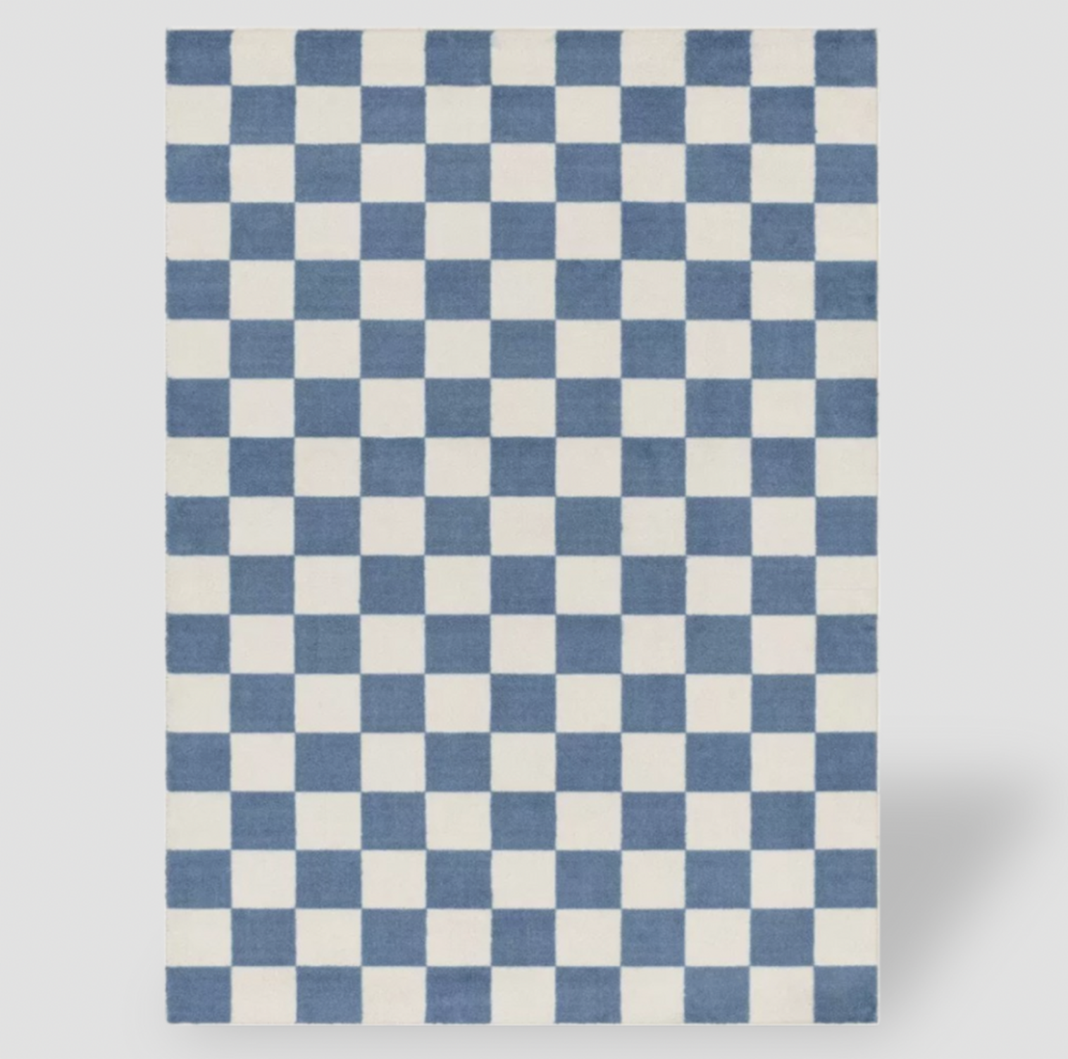 Tapis pour enfants à damier bleu et crème, vue rectangulaire en plongée