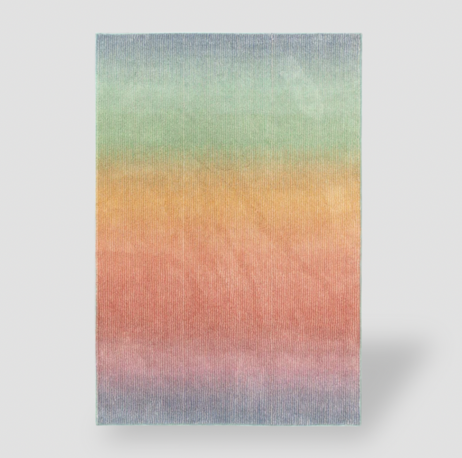 Tapis pour enfants touffeté rectangulaire en dégradé arc-en-ciel avec bandes horizontales bleu, vert, orange, rouge et rose, vue de dessus