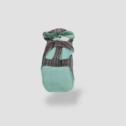 Striped pet poncho hoodie reversed showing mint green fabric lining and hood