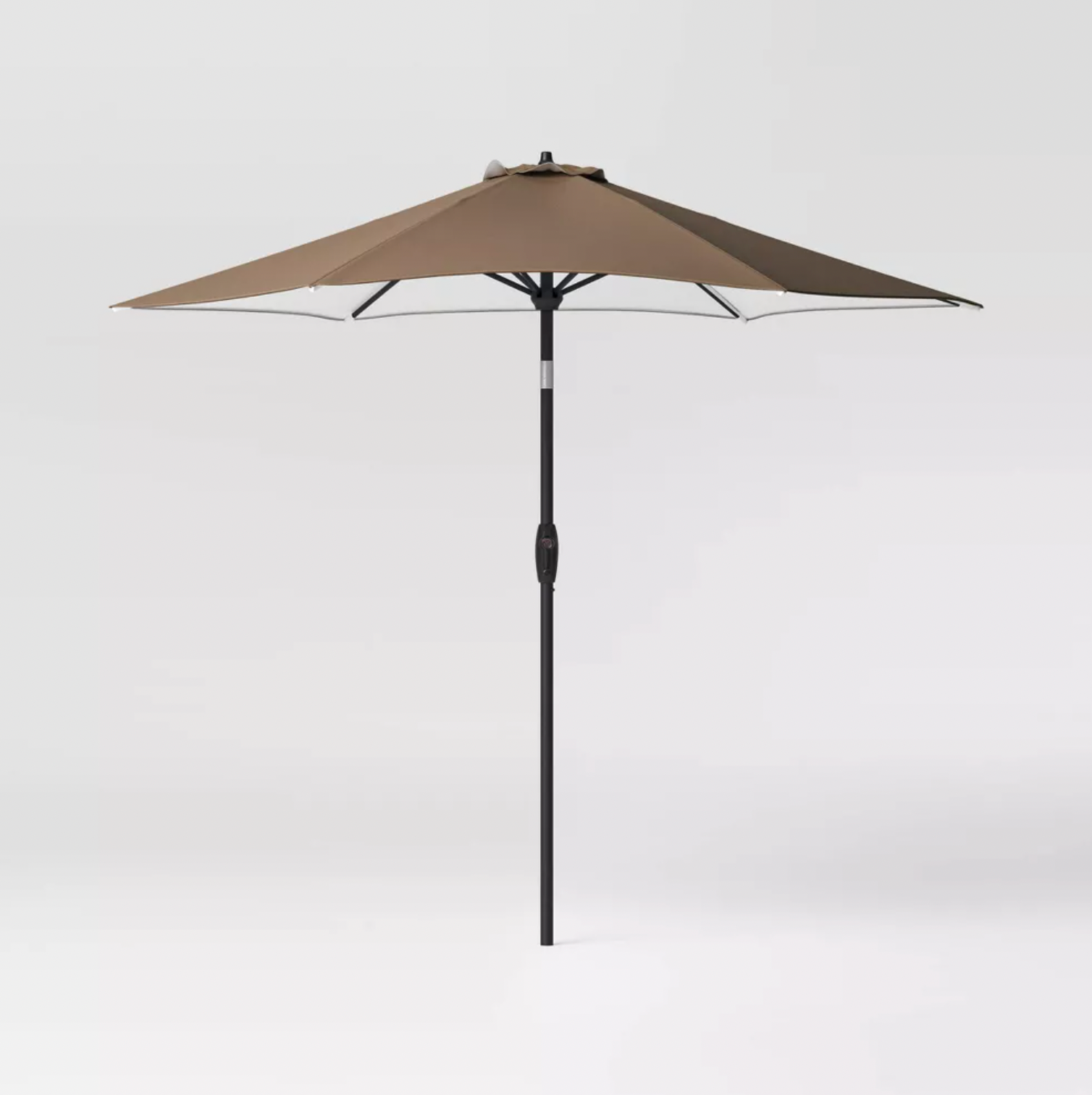 Brown 9 foot round patio umbrella with black pole and tilt crank, three-quarter view
