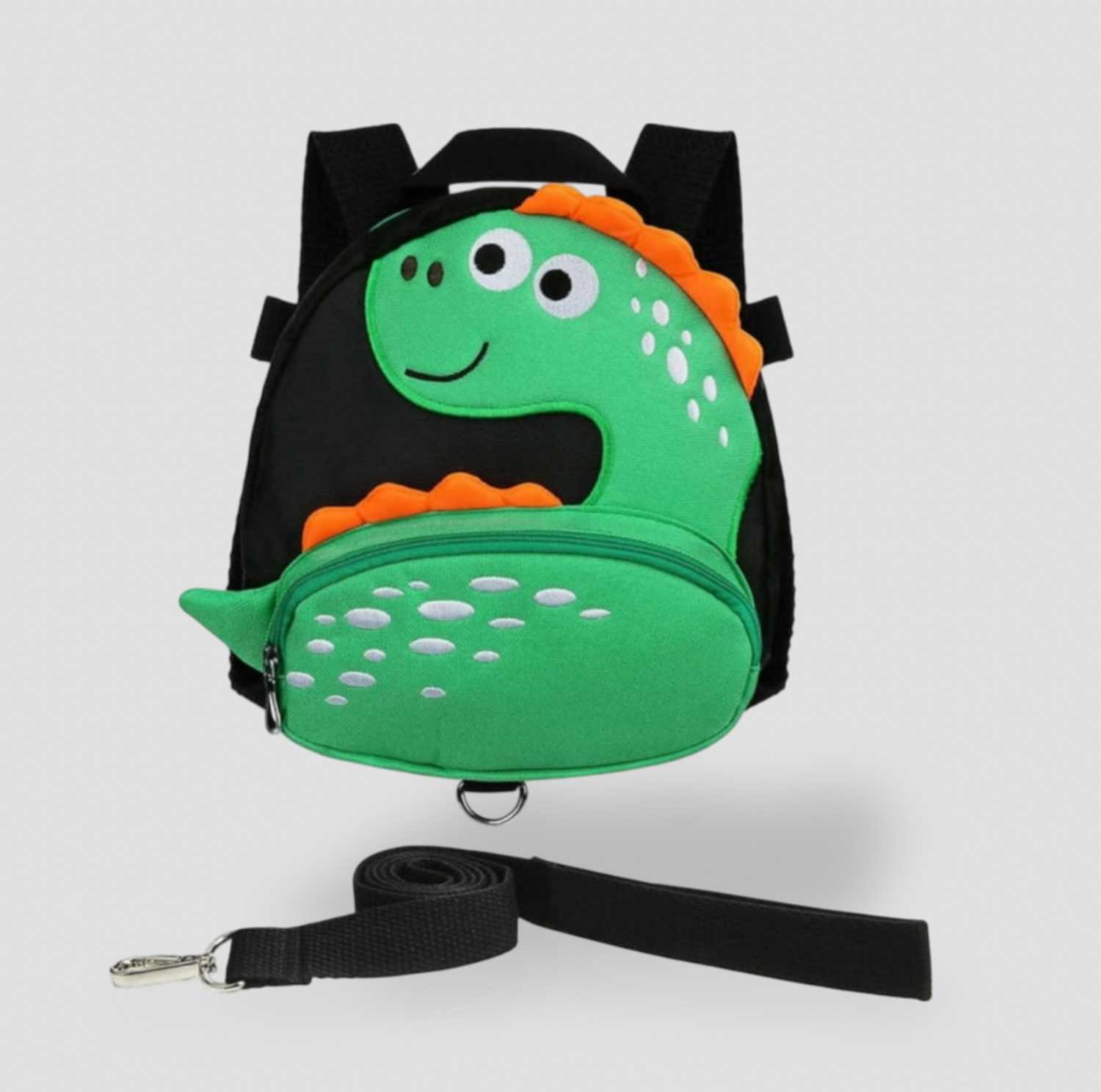 Sac à dos pour tout-petit dinosaure vert avec garniture noire et laisse de sécurité noire détachable, vue de face