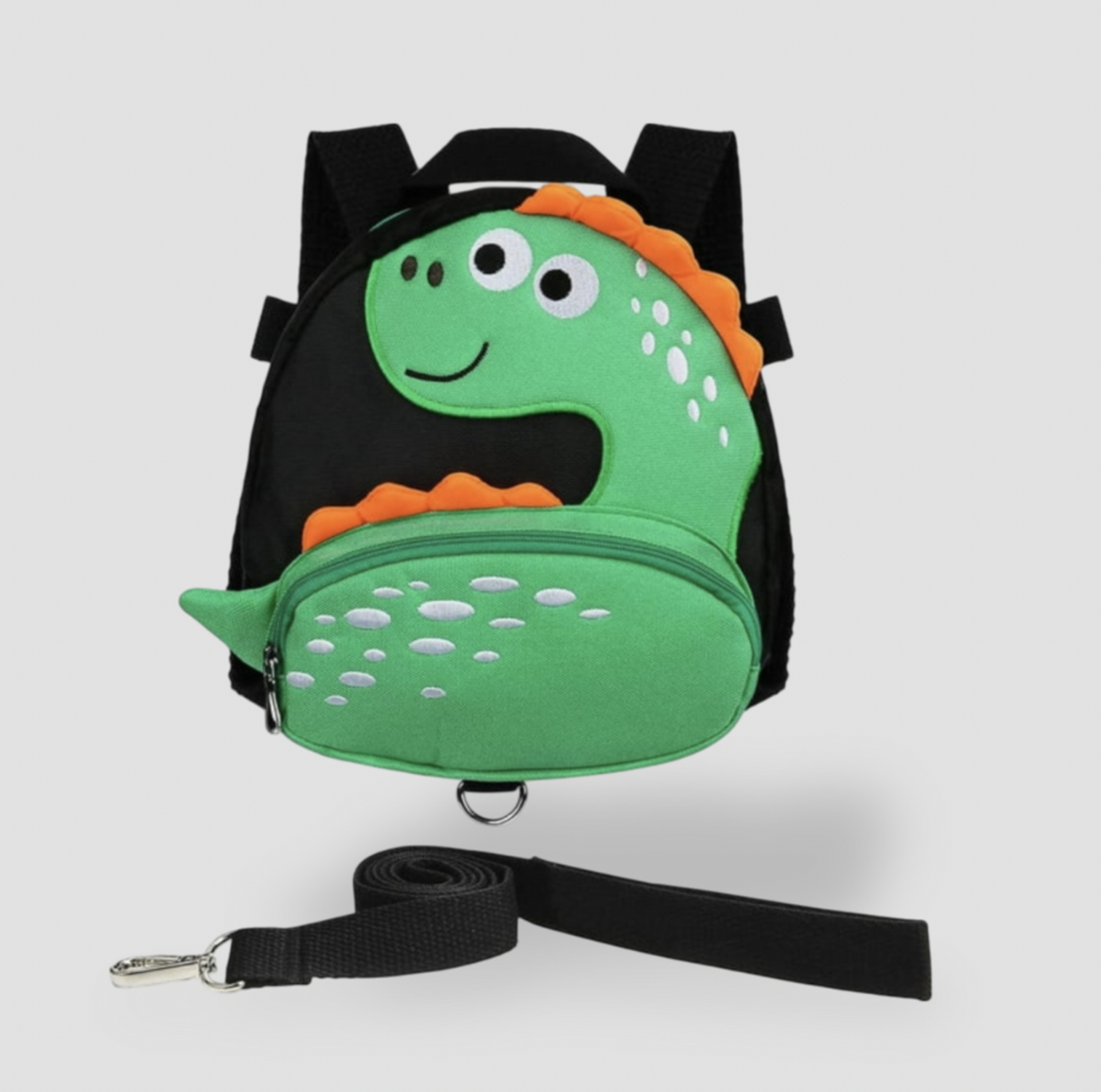 Sac à dos pour tout-petit dinosaure vert avec garniture noire et laisse de sécurité noire détachable, vue de face